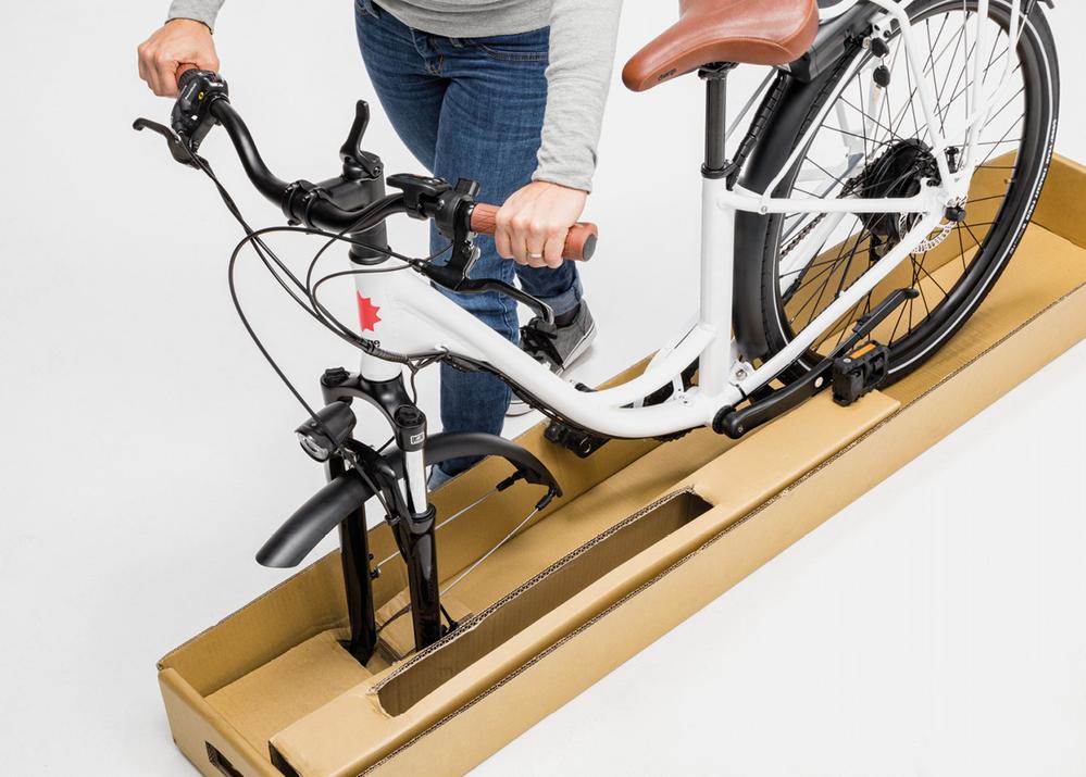How to secure handlebars while assembling electric bike