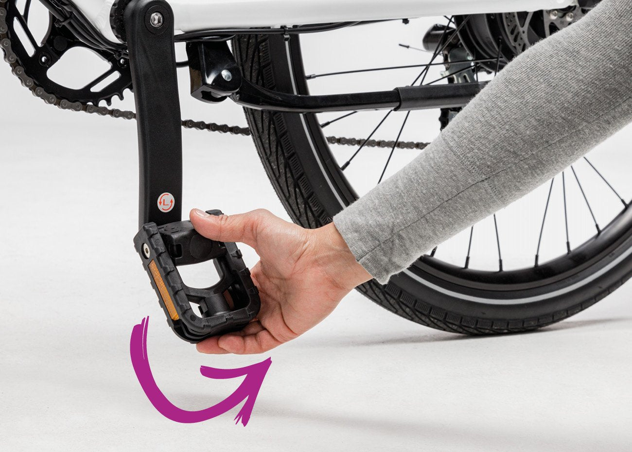 Flip down pedals on Charge City Electric Bike
